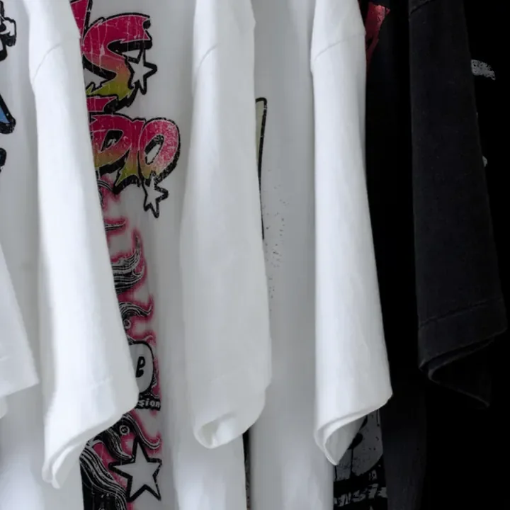 ตัวอย่างรายละเอียดงานสกรีน DTG บนเสื้อสีดำจาก Cottonique DTG