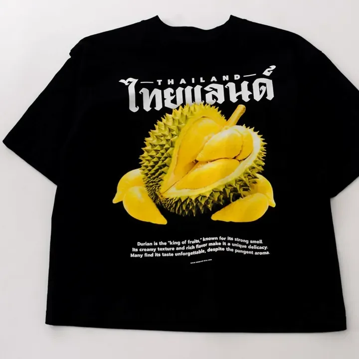 ตัวอย่างรายละเอียดงานสกรีน DTG บนเสื้อสีดำจาก Cottonique DTG