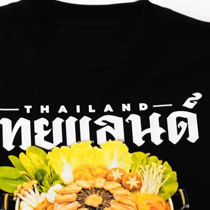 ตัวอย่างรายละเอียดงานสกรีน DTG บนเสื้อสีดำจาก Cottonique DTG