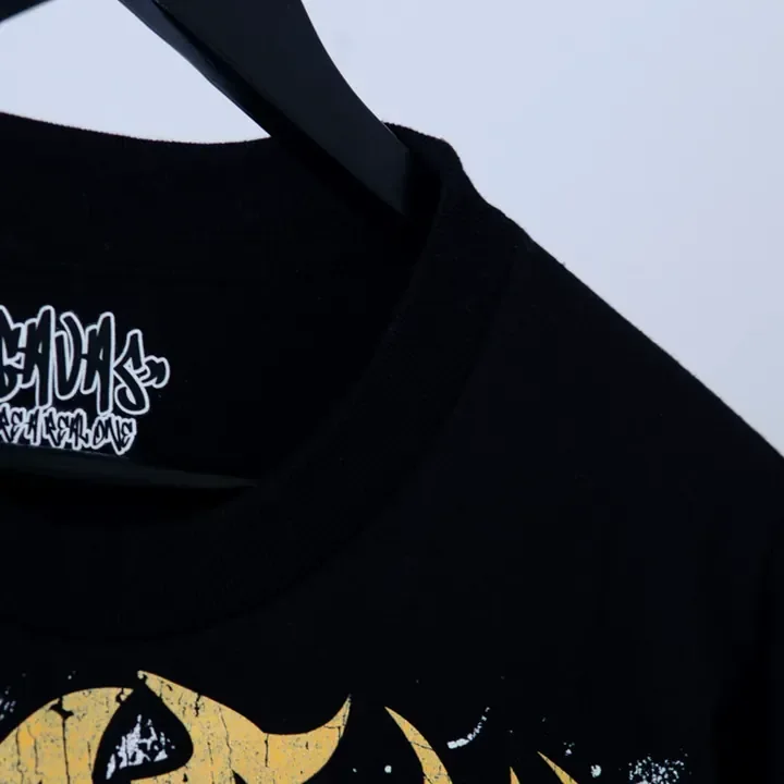 ตัวอย่างรายละเอียดงานสกรีน DTG บนเสื้อสีดำจาก Cottonique DTG