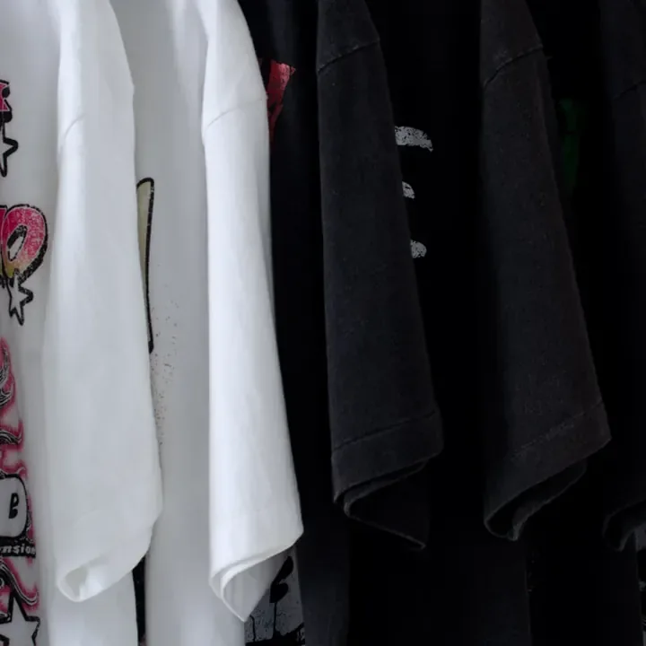 ตัวอย่างรายละเอียดงานสกรีน DTG บนเสื้อสีดำจาก Cottonique DTG